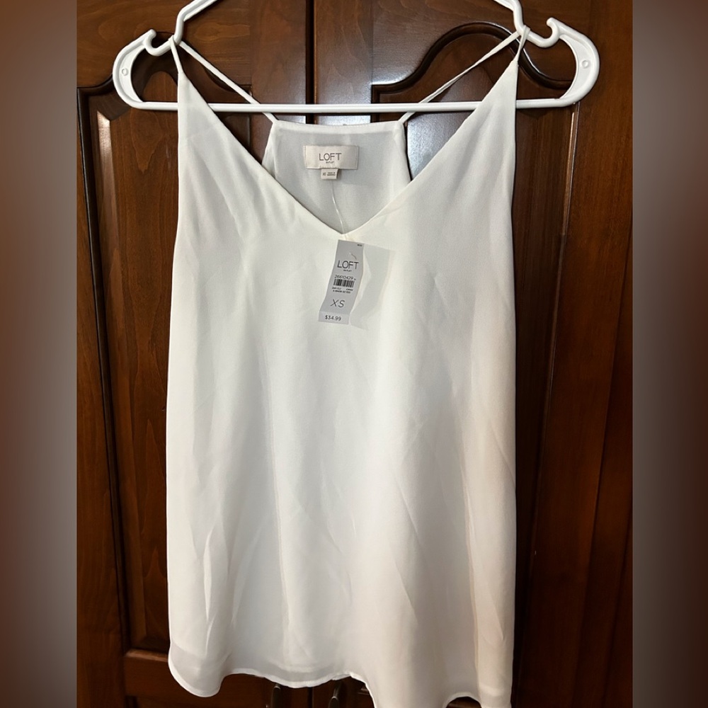 Loft outlet lined tank